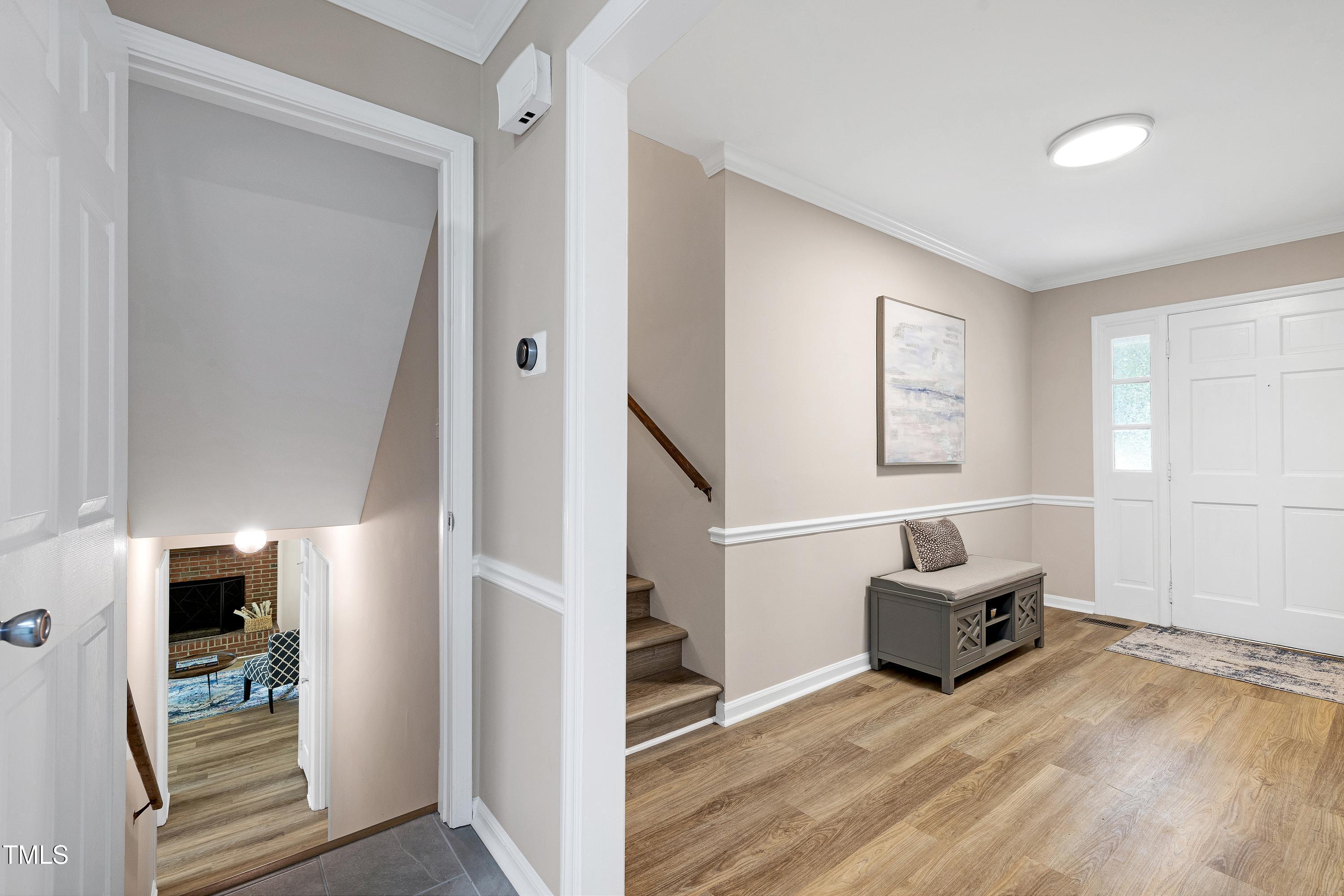 5121 Raintree Road Durham, NC 27712 - Photo 37 of 59 a living room with furniture and a fireplace