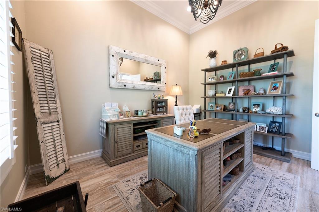 6610 Sable Ridge Lane Naples, FL 34109 - Photo 13 of 50 a kitchen with stainless steel appliances granite countertop a stove and a sink