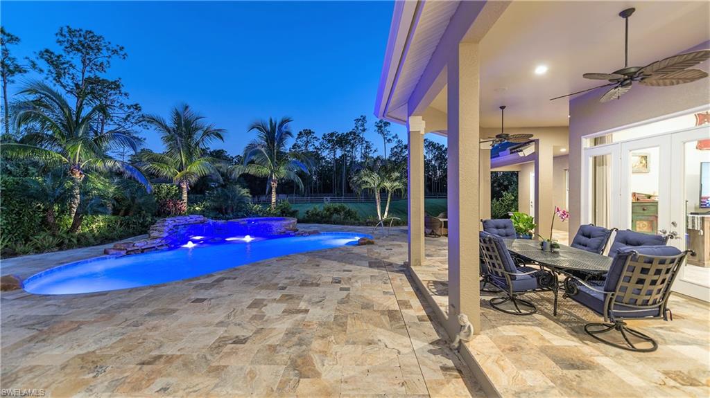 6610 Sable Ridge Lane Naples, FL 34109 - Photo 48 of 50 a view of yard with patio