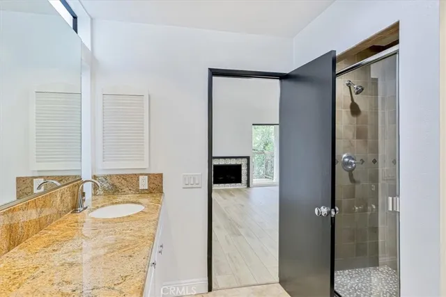a bathroom with a tub and a sink