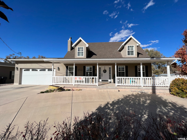 45 East Sevier River Road Central Valley, UT 84754 - Photo 1 of 1 Cape cod home with a porch and a garage