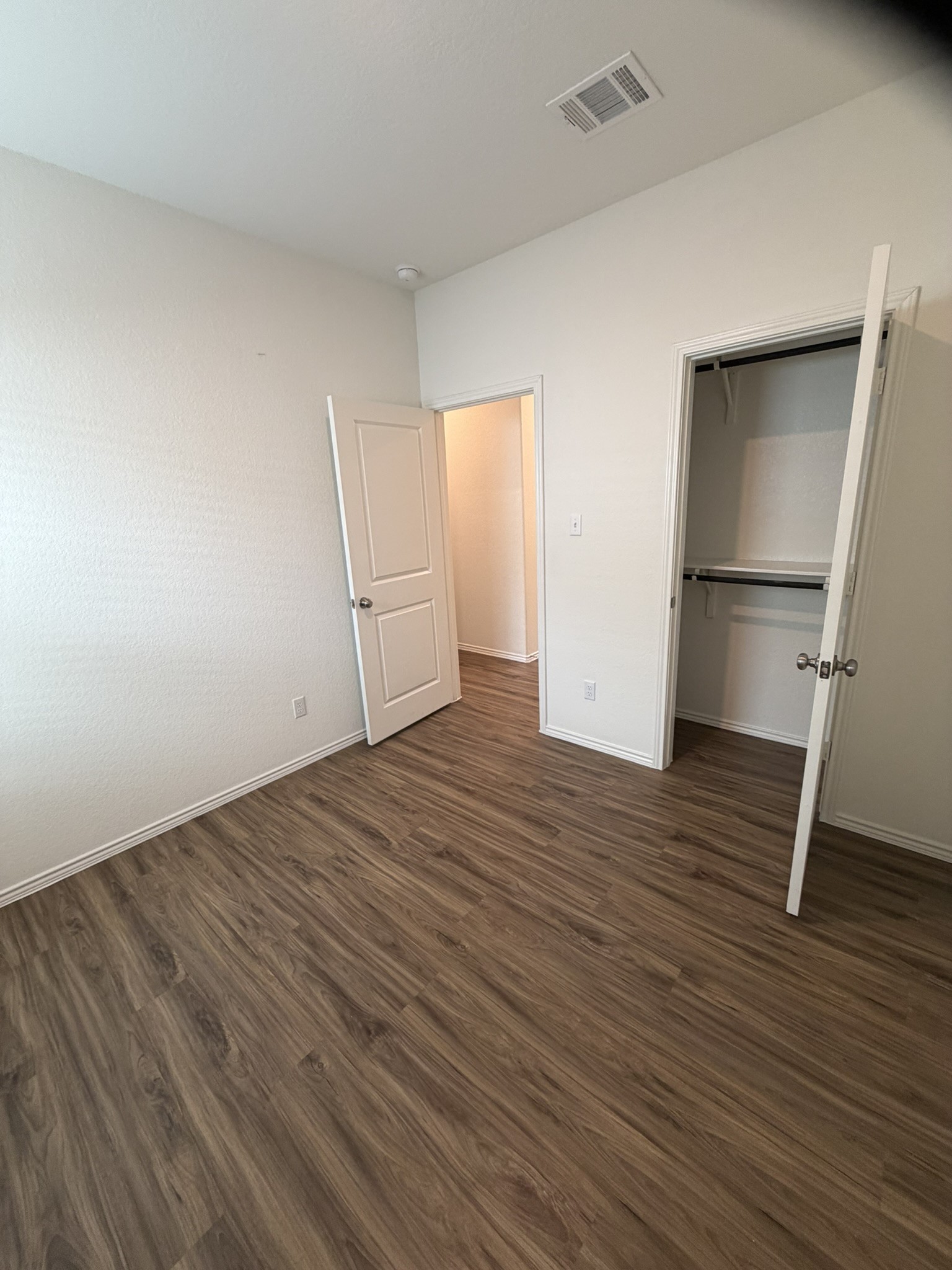 408 Buckners Street Georgetown, TX 78626 - Photo 5 of 15 a view of empty room with wooden floor