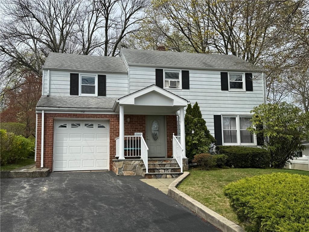 112 Whitman Road Yonkers, NY 10710 - Photo 1 of 1 a view of a house with a yard and large tree