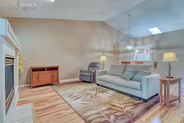 a living room with furniture and a rug
