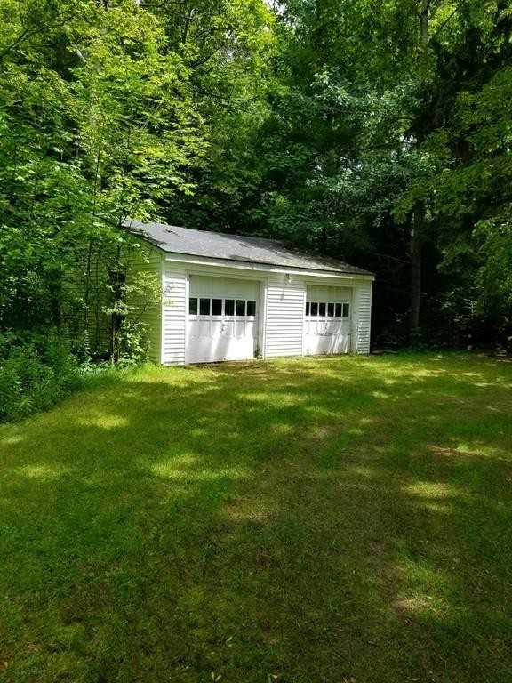 168 Bolton Road Harvard, MA 01451 - Photo 10 of 12 a front view of a house with garden
