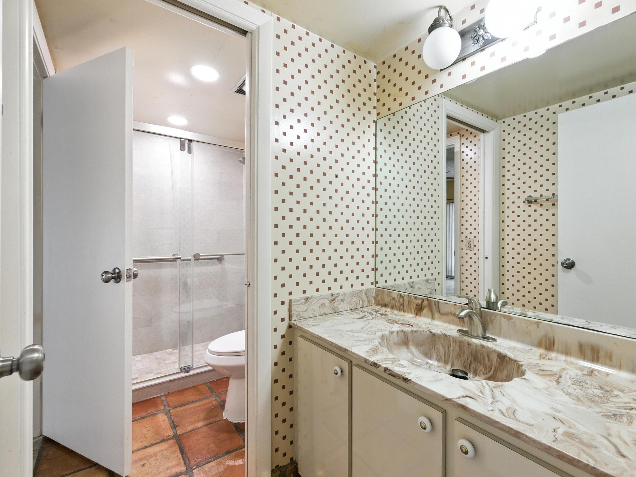 203 Bonnie Brae Way, Unit 34 Hollywood, FL 33021 - Photo 15 of 41 a bathroom with a granite countertop sink toilet and shower
