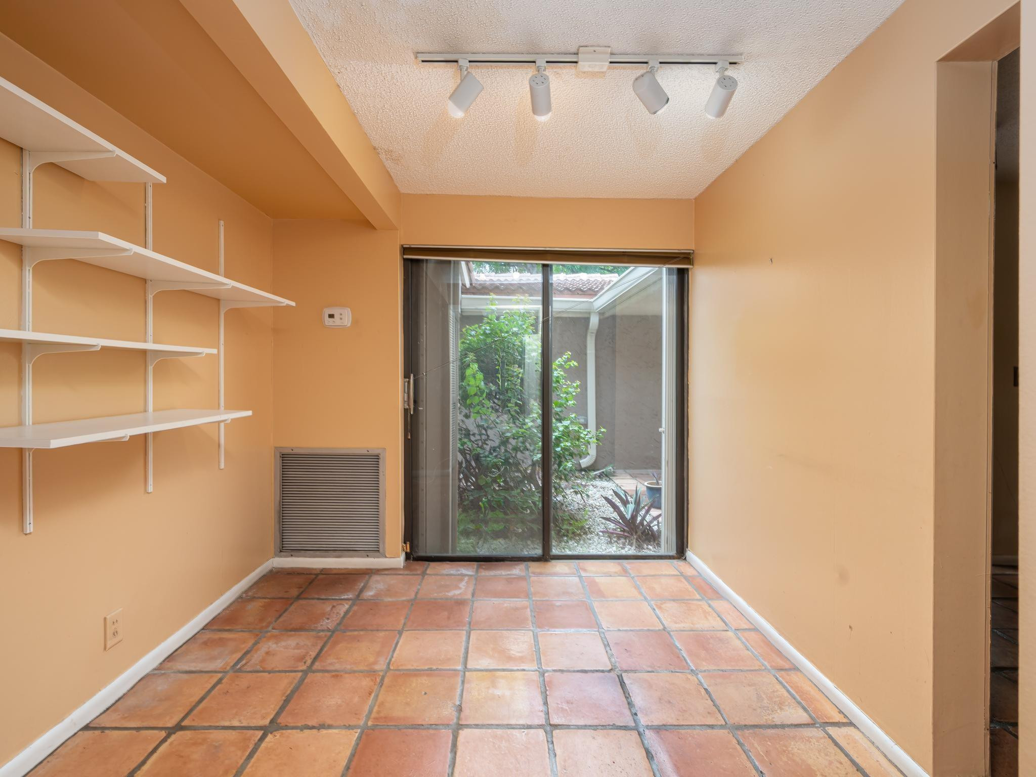 203 Bonnie Brae Way, Unit 34 Hollywood, FL 33021 - Photo 24 of 41 a view of an empty room with a window