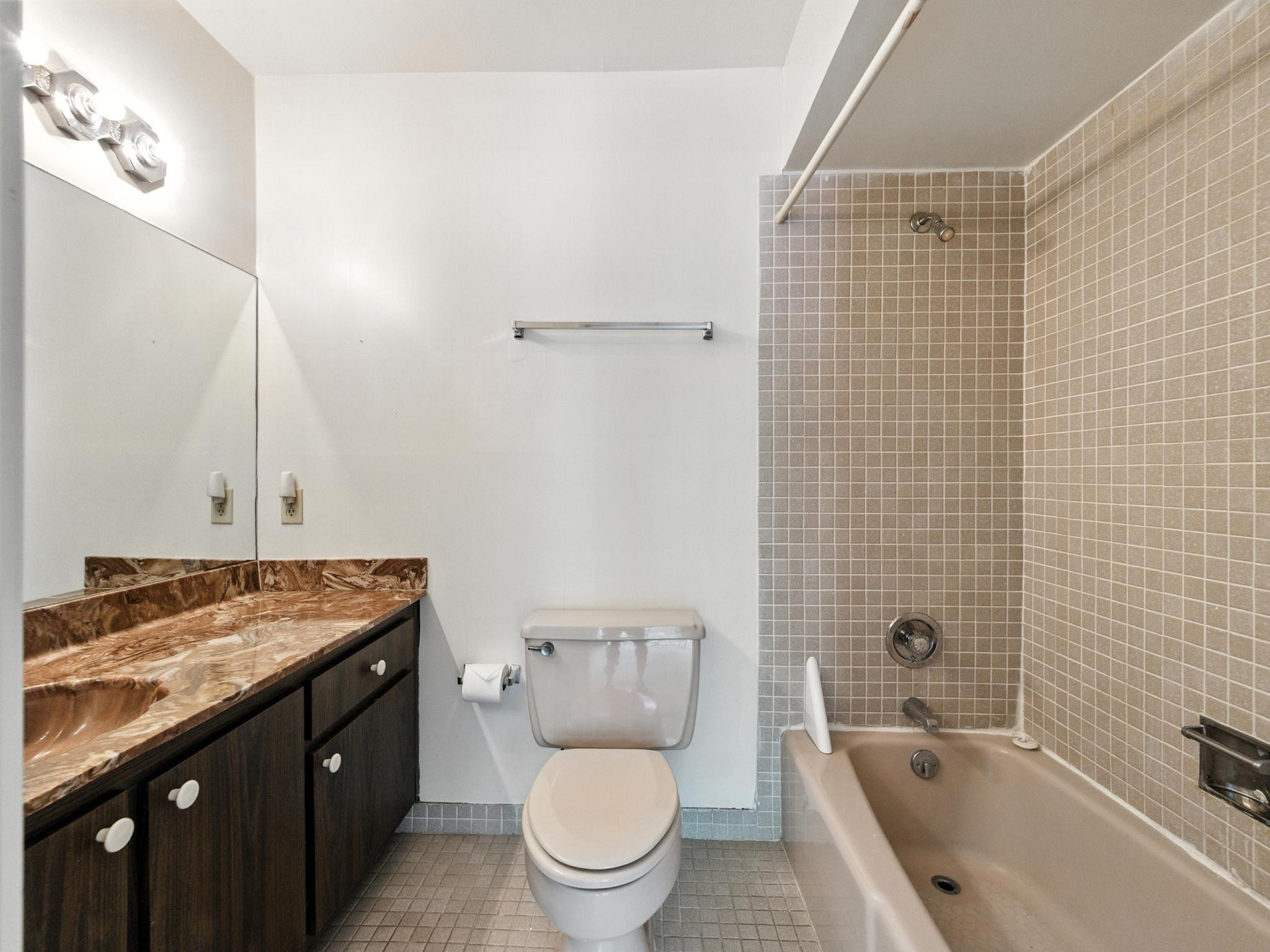 203 Bonnie Brae Way, Unit 34 Hollywood, FL 33021 - Photo 31 of 41 a bathroom with a granite countertop sink a toilet a mirror and shower