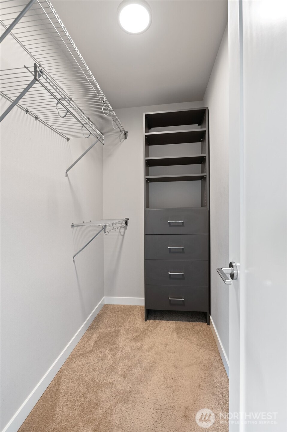 4910 South Willow Street, Unit B Seattle, WA 98118 - Photo 16 of 28 a view of walk in closet