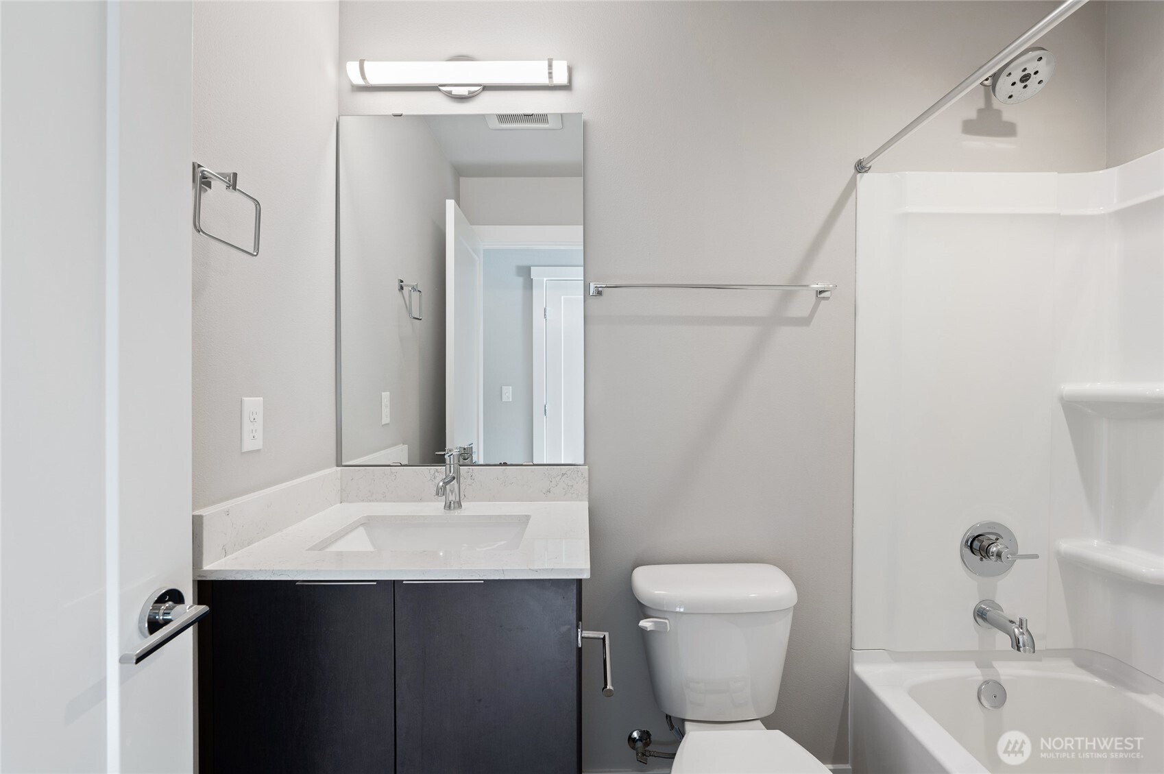 4910 South Willow Street, Unit B Seattle, WA 98118 - Photo 20 of 28 a bathroom with a sink toilet and shower