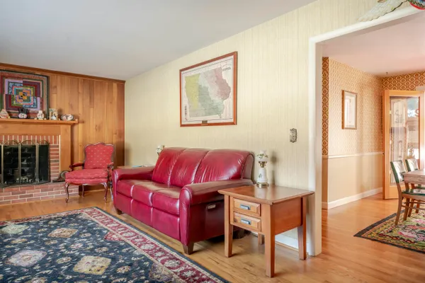 a room that has a table and chairs in it