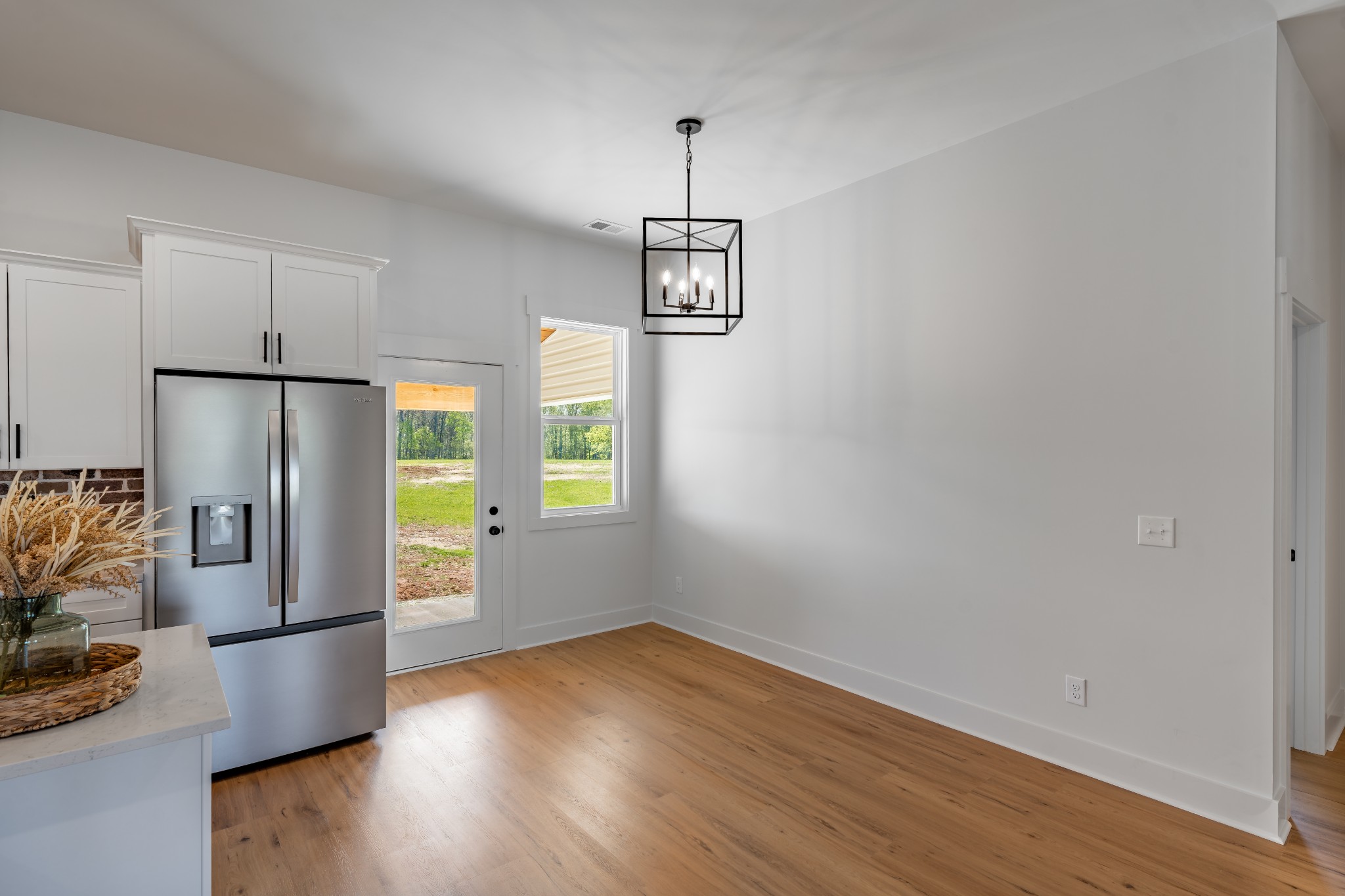 4031 Wells Road Springfield, TN 37172 - Photo 15 of 39 a view of kitchen with furniture and wooden floor