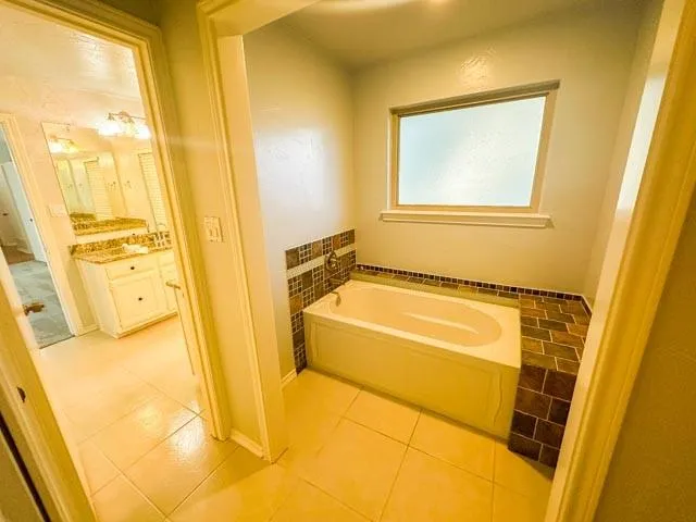 a bathroom with a toilet and shower