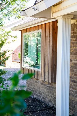 a view of a porch with a yard