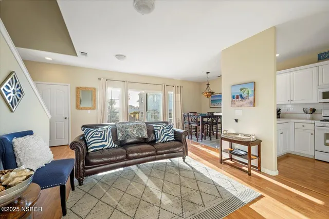 a living room with furniture and a table