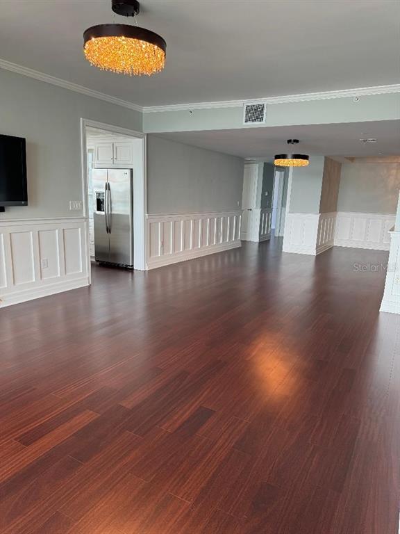 331 Cleveland Street, Unit 1504 Clearwater, FL 33755 - Photo 33 of 46 a view of a livingroom with wooden floor