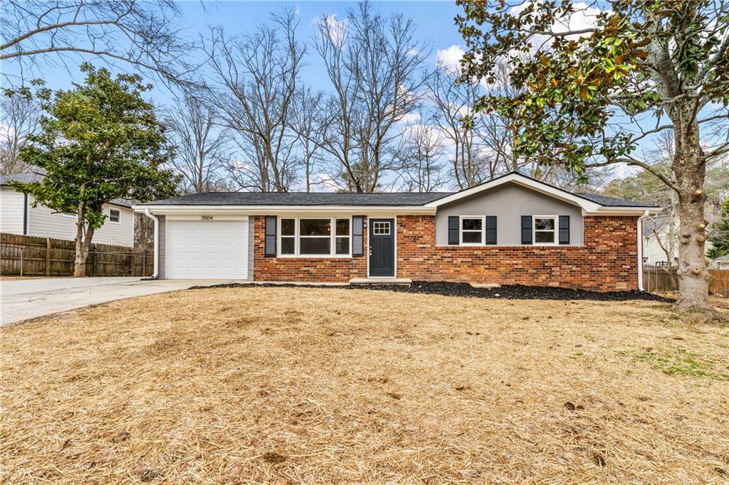 3504 Ridgecrest Drive Powder Springs, GA 30127 - Photo 1 of 1 a house with trees in the background