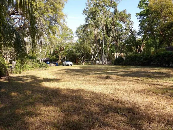 a view of a playground with basketball court