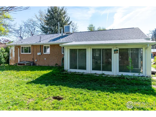 a view of a house with a garden