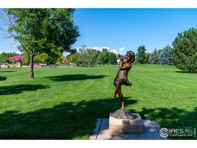 a view of a garden with a fountain