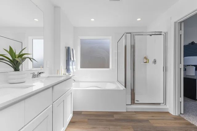 a bathroom with a sink and a large mirror