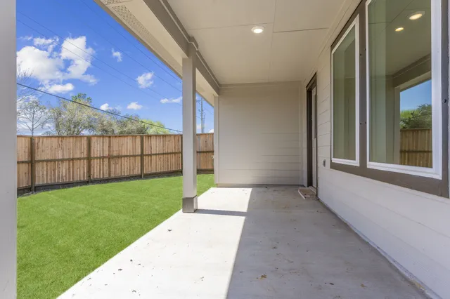a view of a backyard with a garden