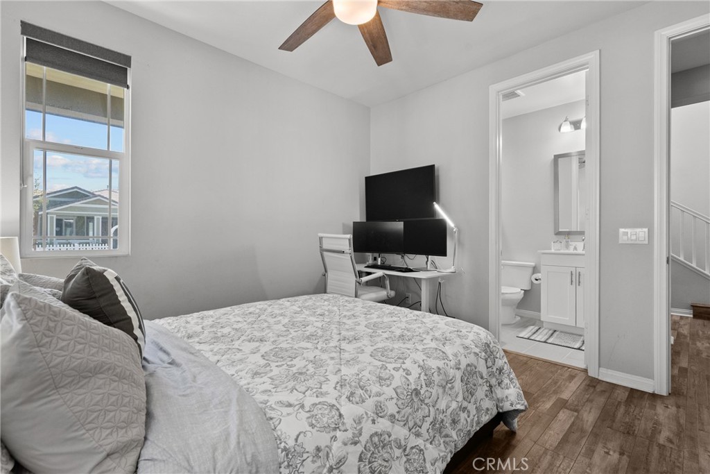 232 River Street Fillmore, CA 93015 - Photo 21 of 61 a bedroom with a bed and a flat screen tv
