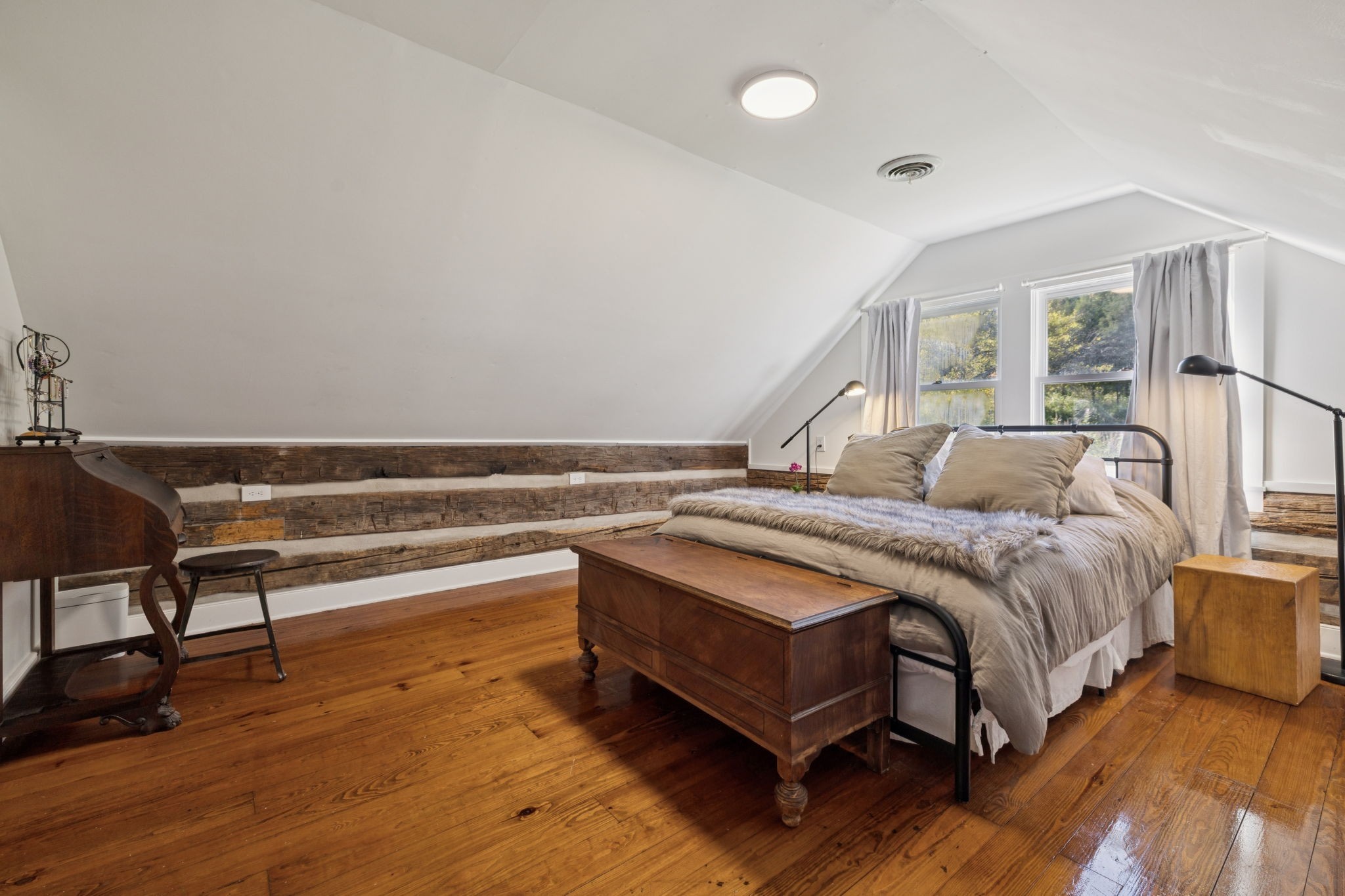 2060 Old Hillsboro Road Franklin, TN 37064 - Photo 50 of 75 a spacious bedroom with a bed and a chair
