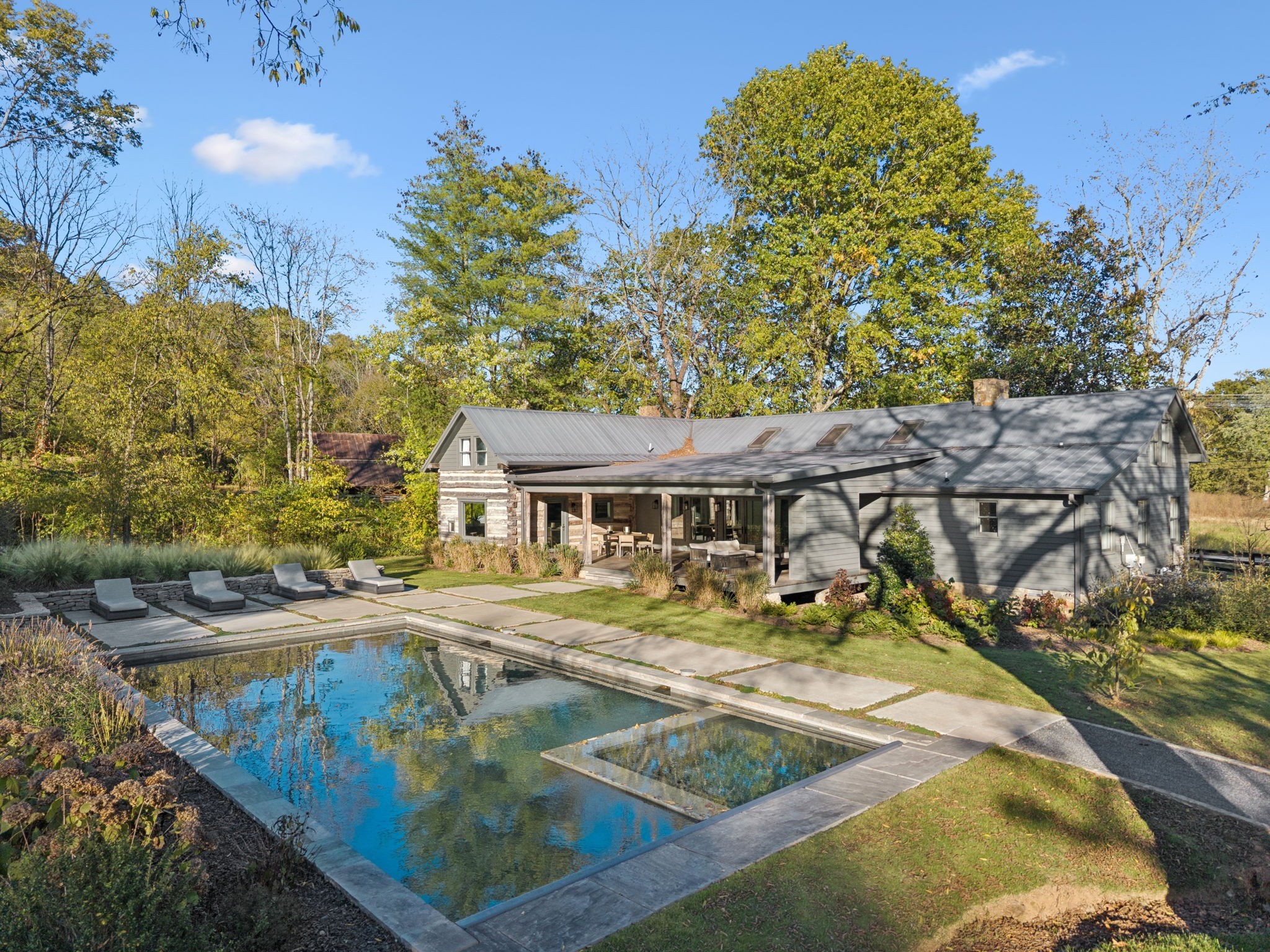 2060 Old Hillsboro Road Franklin, TN 37064 - Photo 64 of 75 a view of a house with pool and sitting area