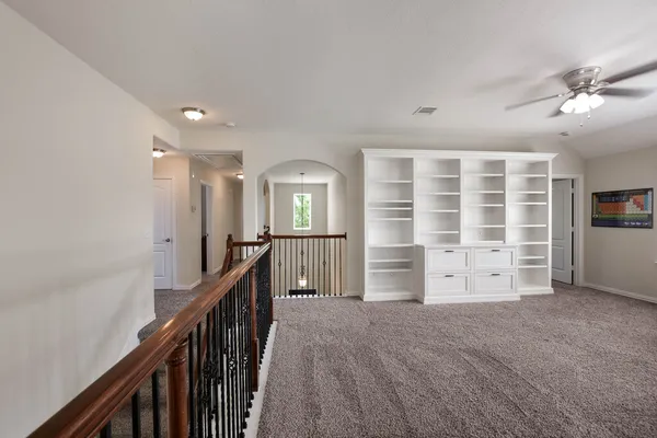 a view of a house with stairs and a window