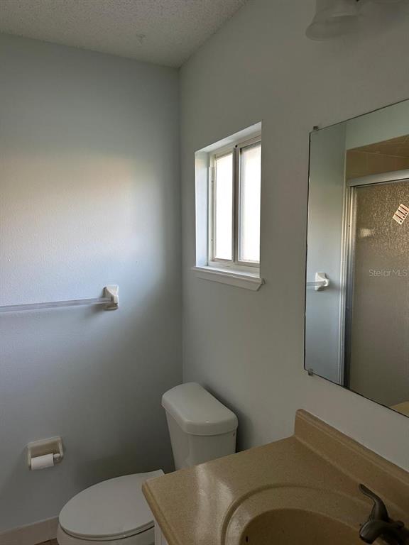 11248 Southwest 76th Terrace Ocala, FL 34476 - Photo 13 of 17 a bathroom with a toilet