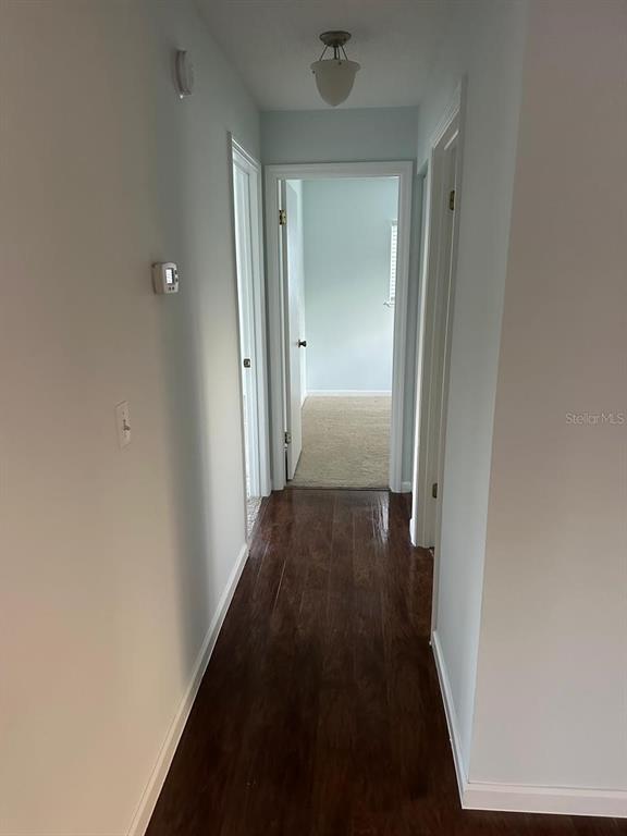 11248 Southwest 76th Terrace Ocala, FL 34476 - Photo 7 of 17 a view of a hallway