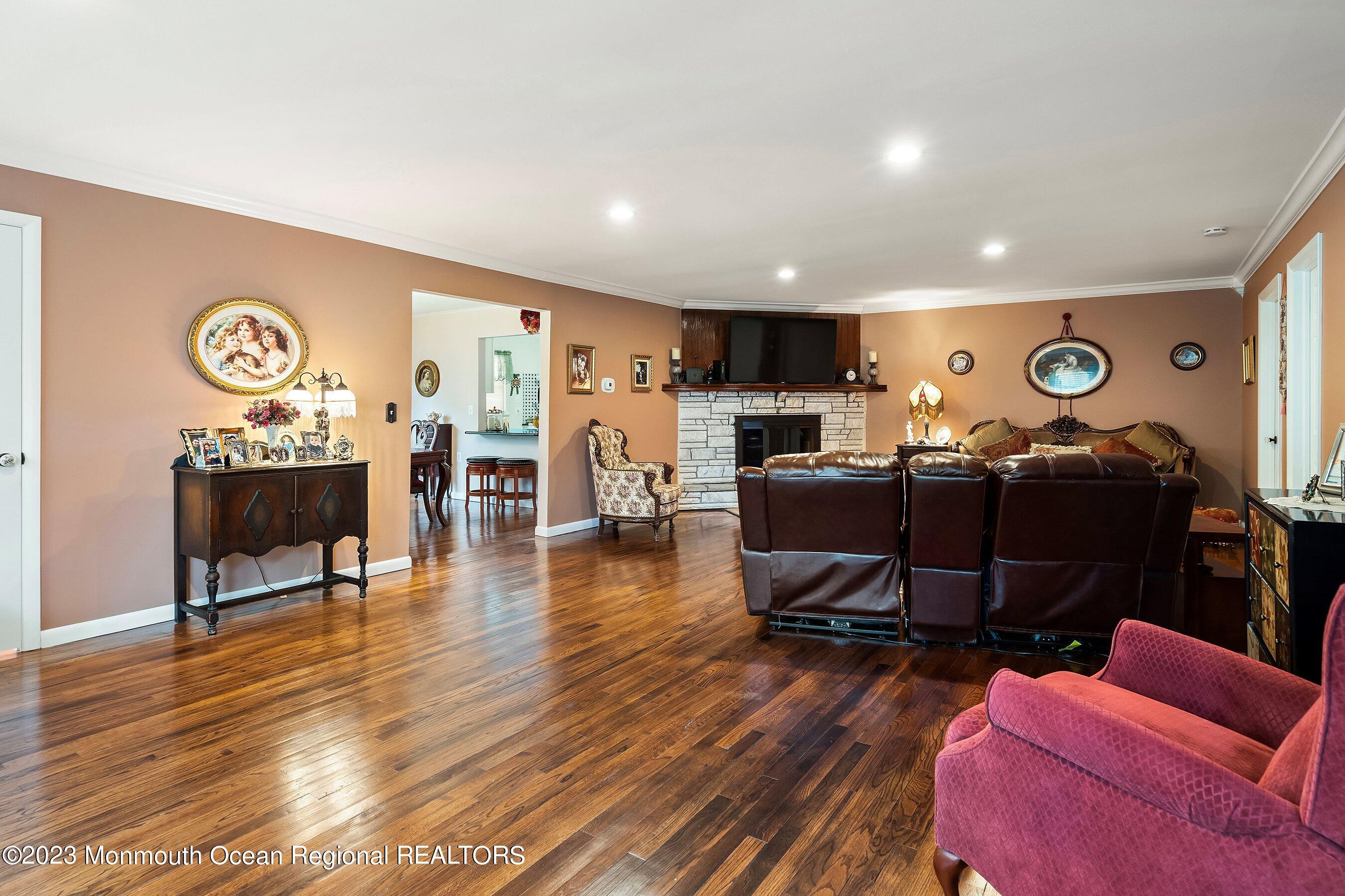 655 Burke Road Jackson, NJ 08527 - Photo 2 of 23 a living room with furniture and wooden floor