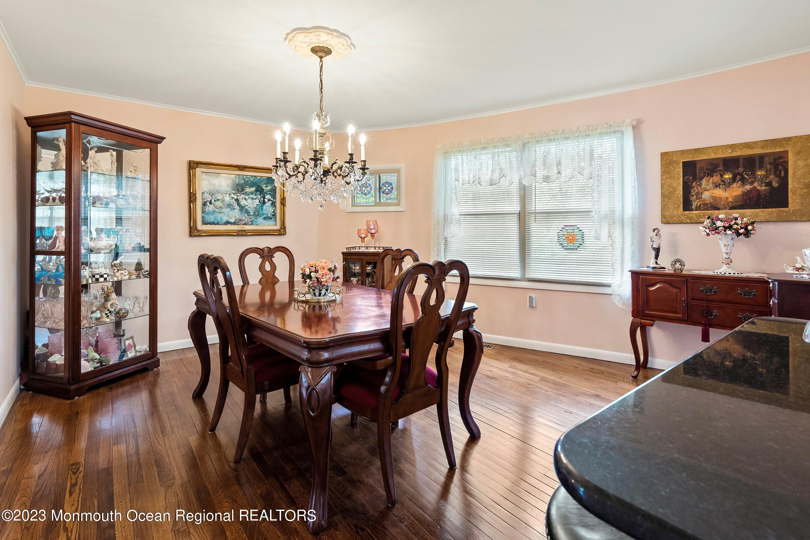 655 Burke Road Jackson, NJ 08527 - Photo 5 of 23 a view of a dining room with furniture window and wooden floor