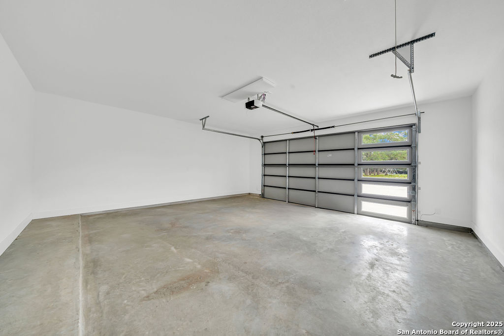 661 Jonquil Drive Spring Branch, TX 78070 - Photo 17 of 18 a view of a room with storage and racks