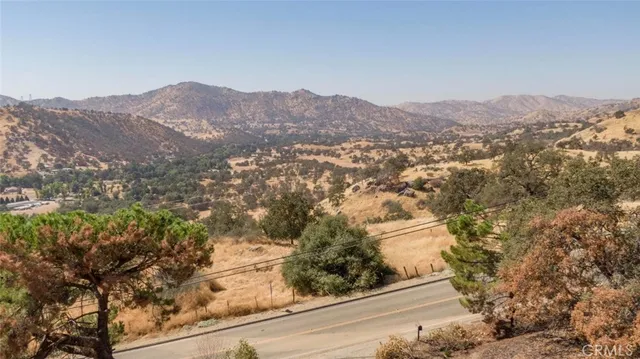 an aerial view of residential house and green space