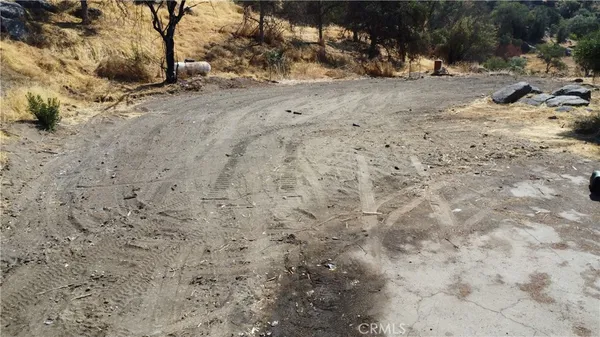 a view of a backyard of a house