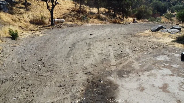 a view of a backyard of a house