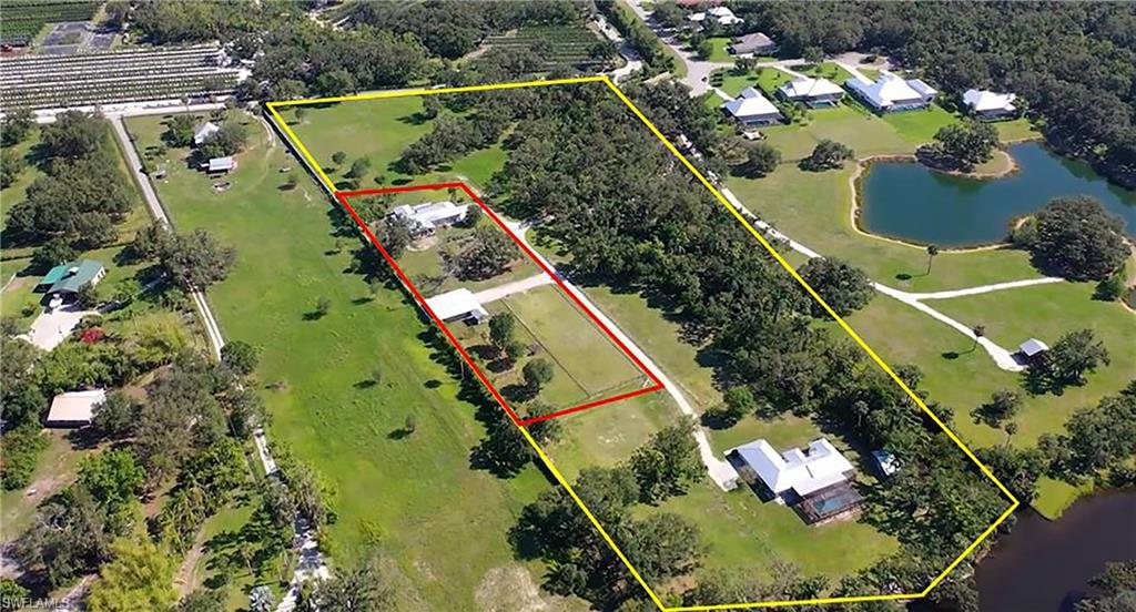 4231-4241 Orange River Loop Road Fort Myers, FL 33905 - Photo 25 of 50 an aerial view of a residential houses with outdoor space and street view