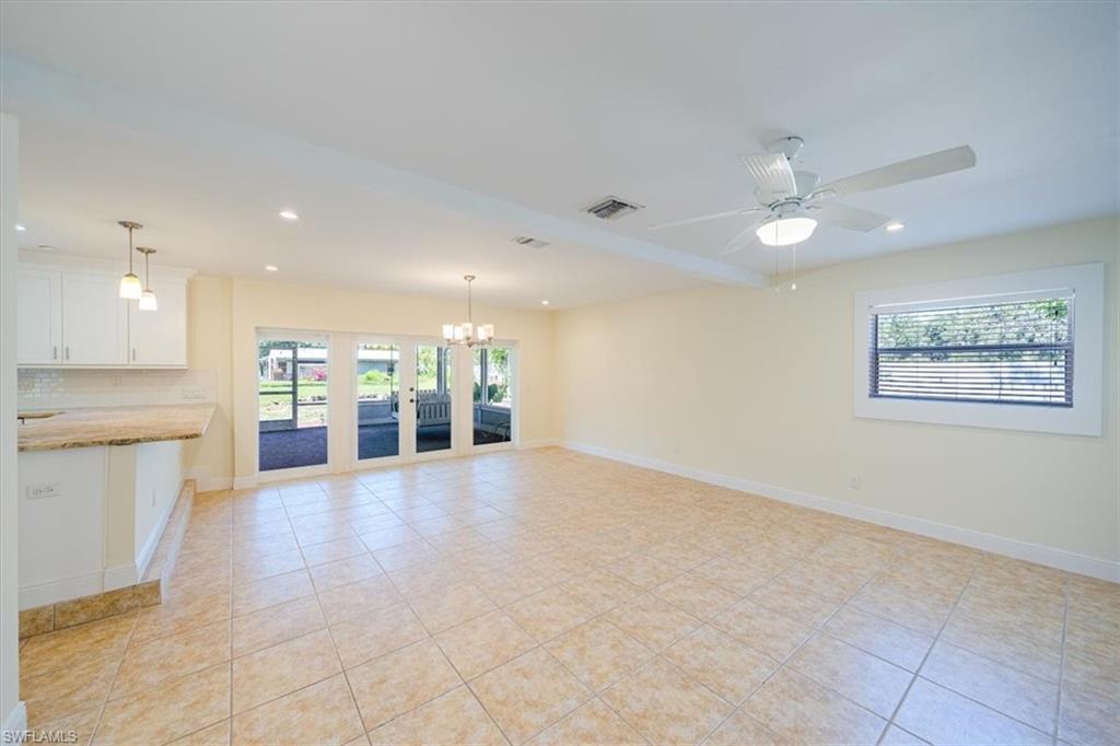 4231-4241 Orange River Loop Road Fort Myers, FL 33905 - Photo 37 of 50 a view of an empty room with a kitchen
