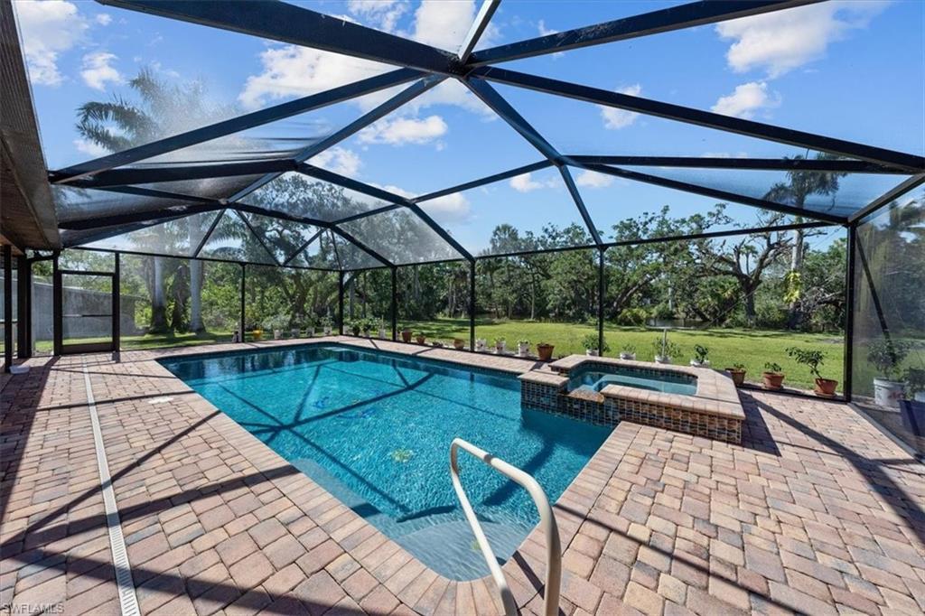 4231-4241 Orange River Loop Road Fort Myers, FL 33905 - Photo 9 of 50 a view of swimming pool with a patio