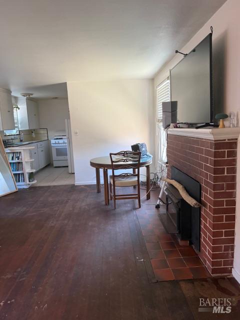 618 Benton Street Santa Rosa, CA 95404 - Photo 18 of 27 a living room with furniture and a fireplace
