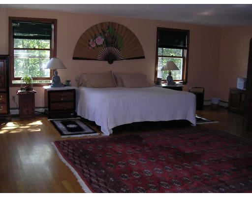 5 Emery Road Townsend, MA 01469 - Photo 4 of 10 a bed room with a bed and a window