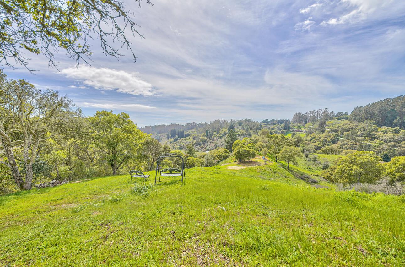 420 Yellowbrick Road Watsonville, CA 95076 - Photo 18 of 23 a view of a yard with an trees