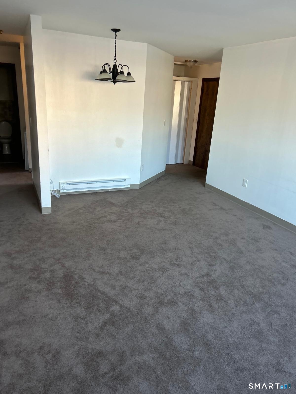 45 Stevens Street, Unit 28 Bridgeport, CT 06606 - Photo 3 of 3 an empty room with windows