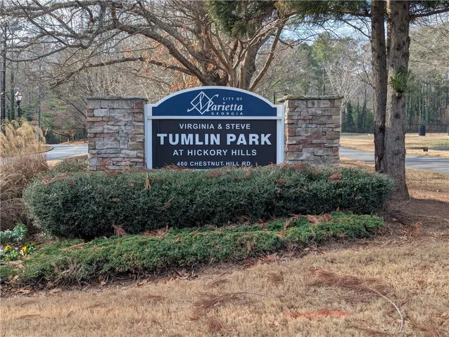 a terrace with outdoor seating and city view