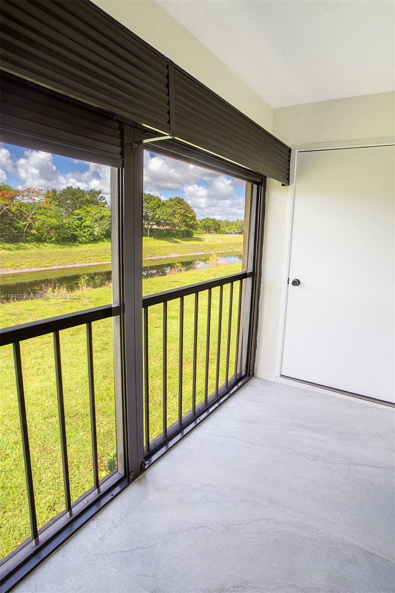 9431 Boca Cove Circle, Unit 1009 Boca Raton, FL 33428 - Photo 27 of 30 a view of a large window with an outdoor space