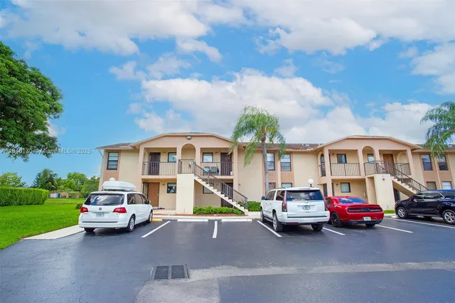 a car parked in front of a house