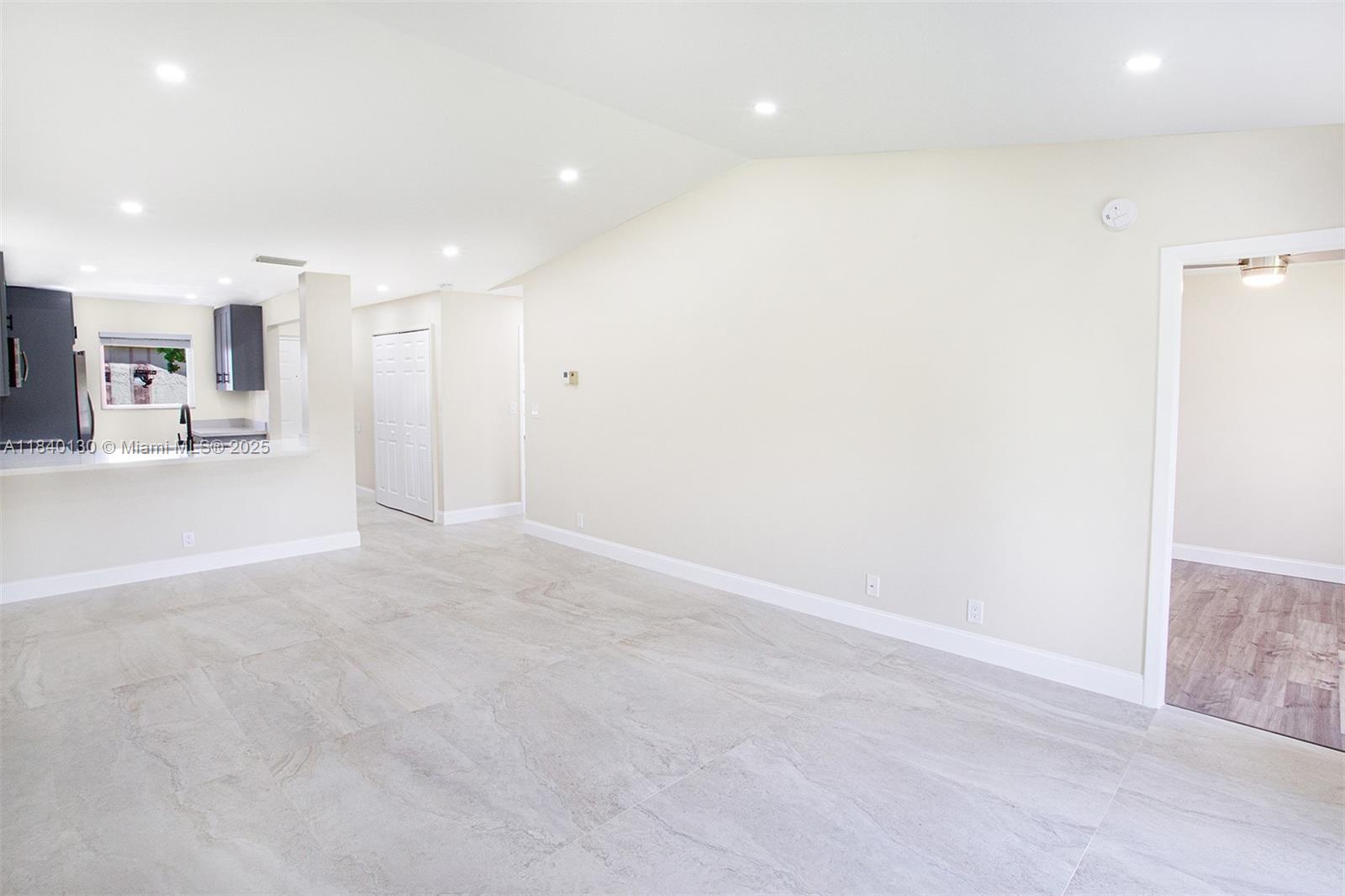 9431 Boca Cove Circle, Unit 1009 Boca Raton, FL 33428 - Photo 10 of 30 a view of a hallway
