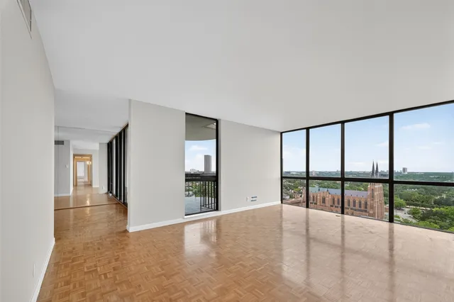 wooden floor and windows in an empty room
